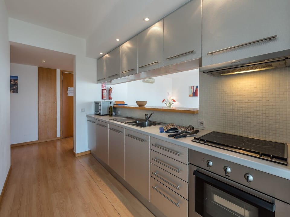 Well equipped kitchen .