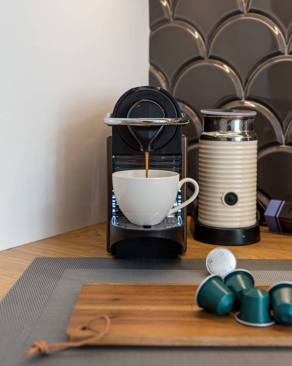 Nespresso coffee machine and milk frother.