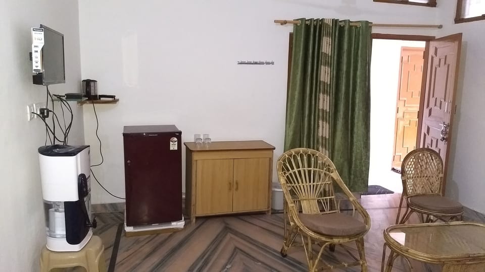 Fridge, TV and Water Purifier with seating area