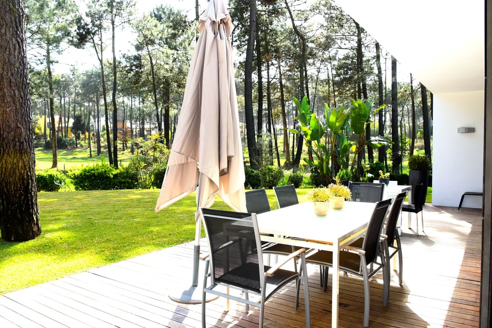 Outside dining area with golf fairway view