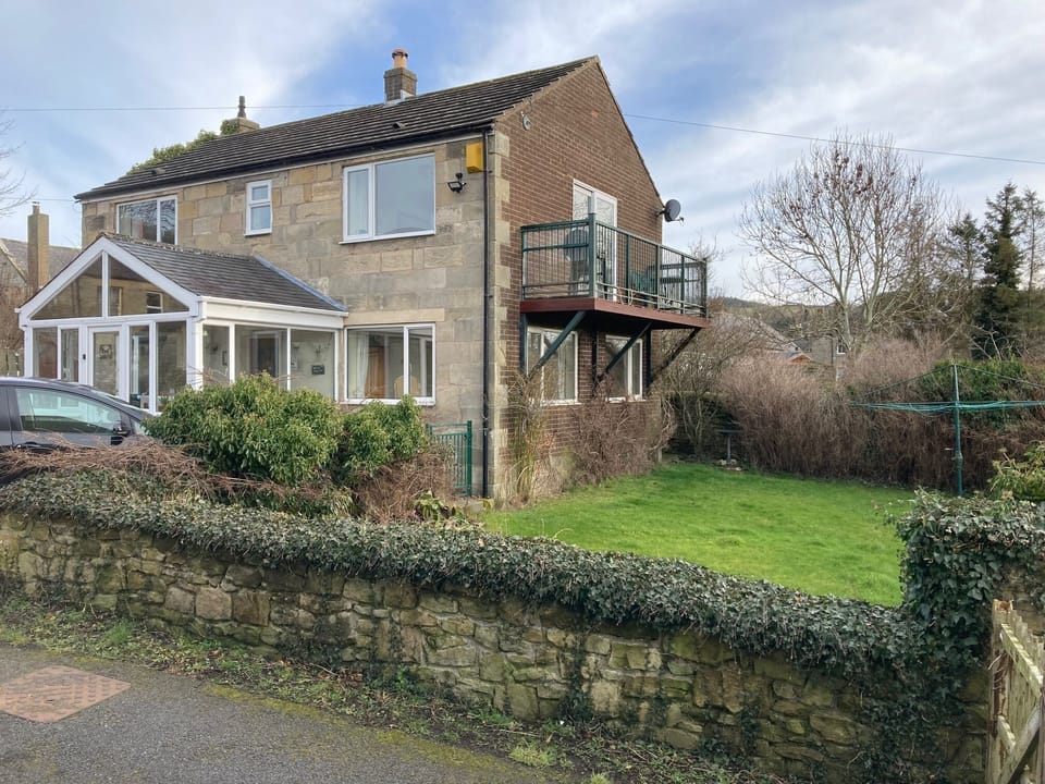 Exterior showing balcony and garden