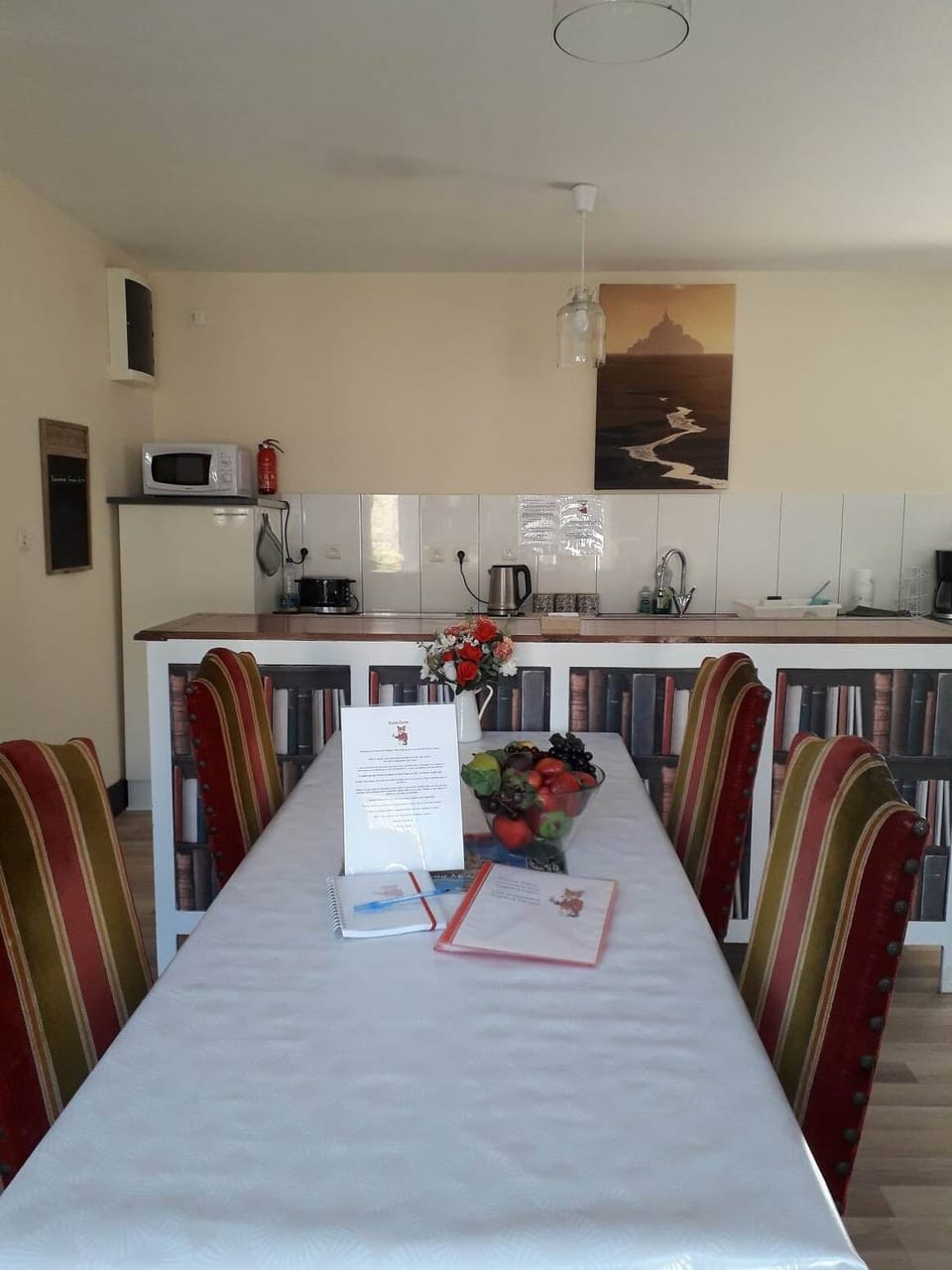 Large dining table and antique chairs