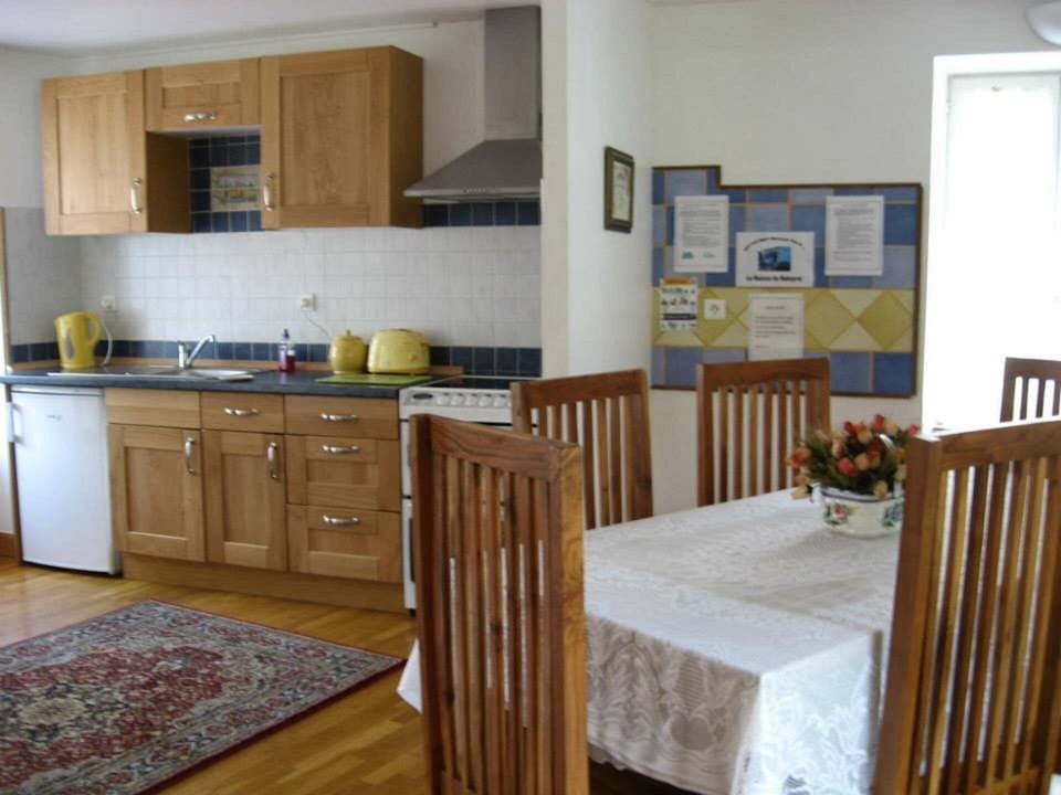 The Kitchen/Dining has a patio door which leads out onto the enclosed garden