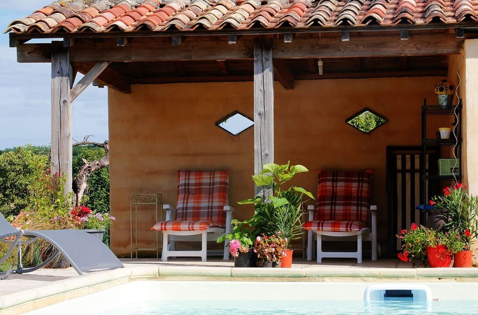 Cool off in the Shade of the Pool House