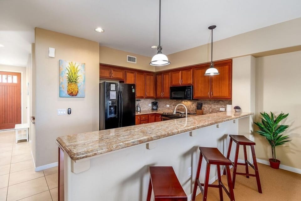 Granite bar with seating.