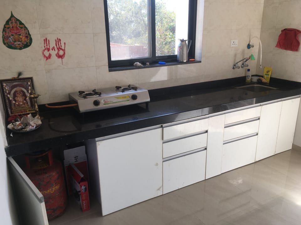 Kitchen with trolly and gas and stove