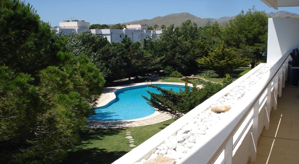 View from balcony of pool and garden