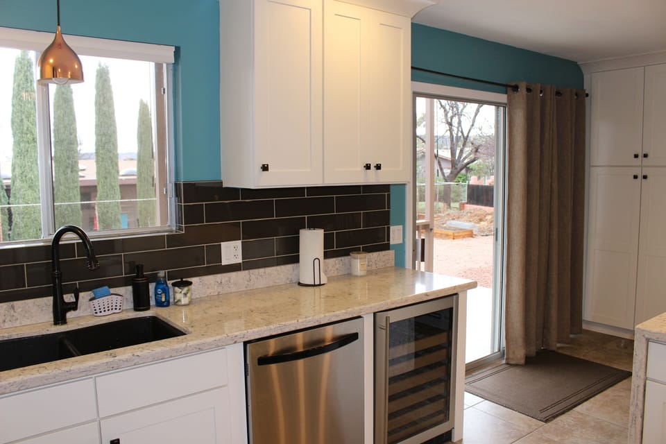 Kitchen with beverage fridge