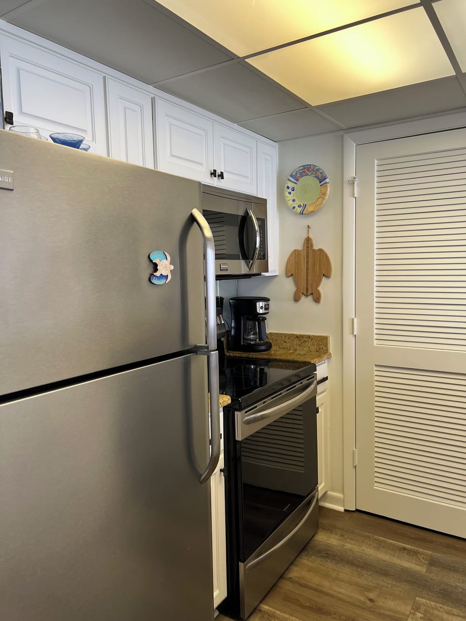 Newer Stainless Appliances and Stylish and Fun Dinnerware 
