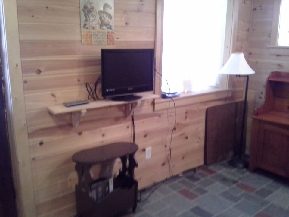 Mud room on 1st floor with tv dvd and Futon
