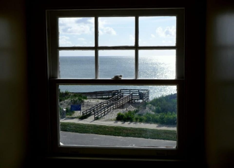 Wonderful bay views from every room. Beach access steps away!