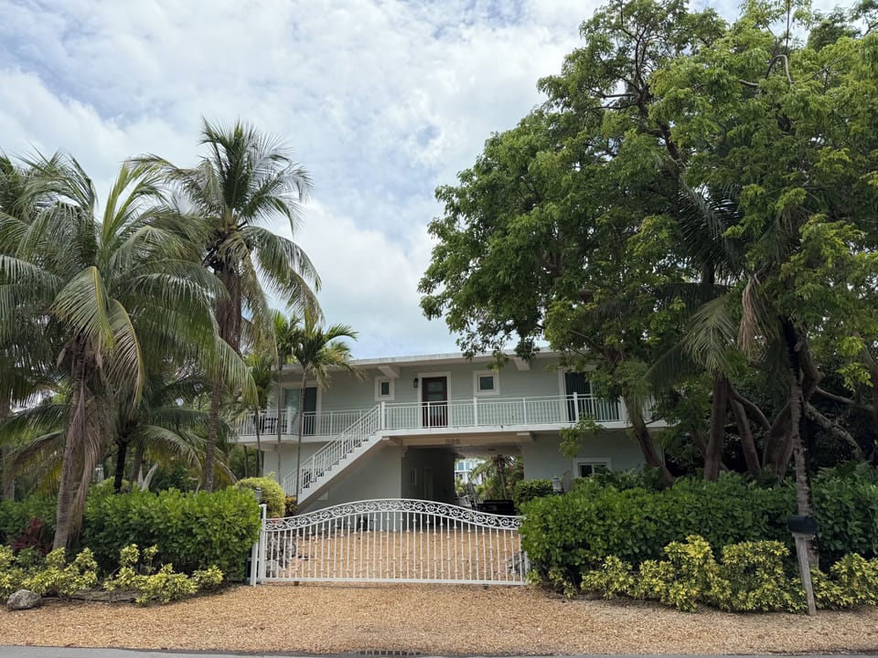 Lush tropical waterfront estate. Private, secure and steps from the beach