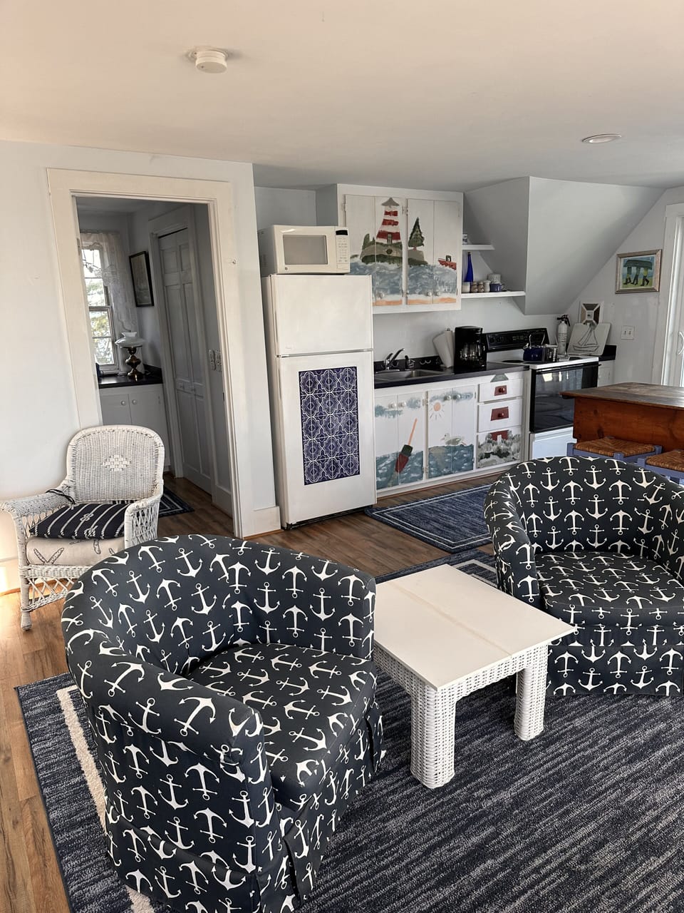 Attached guest quarters with full kitchen and waterfront deck