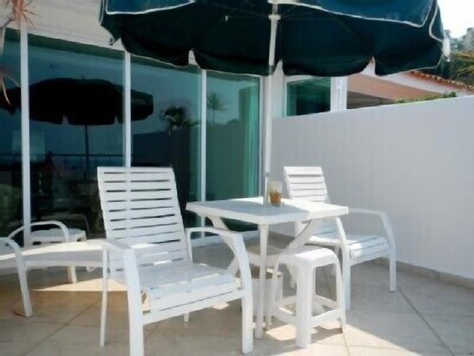 Private terrace with sliding doors that open complete to 4th and last panel.
