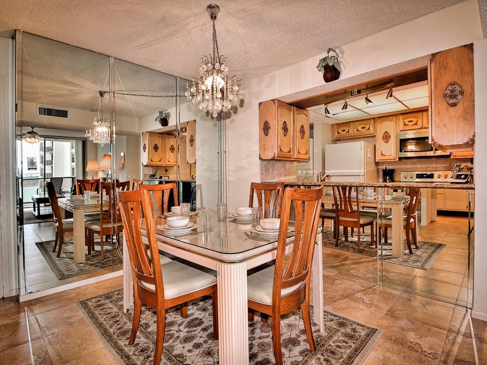 Dining table has seating for 4 guests.