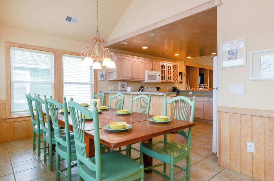 Top floor large dining area next to kitchen