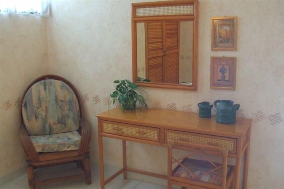 Handcrafted natural bamboo furnishings accentuate tropical decor of all villas!
