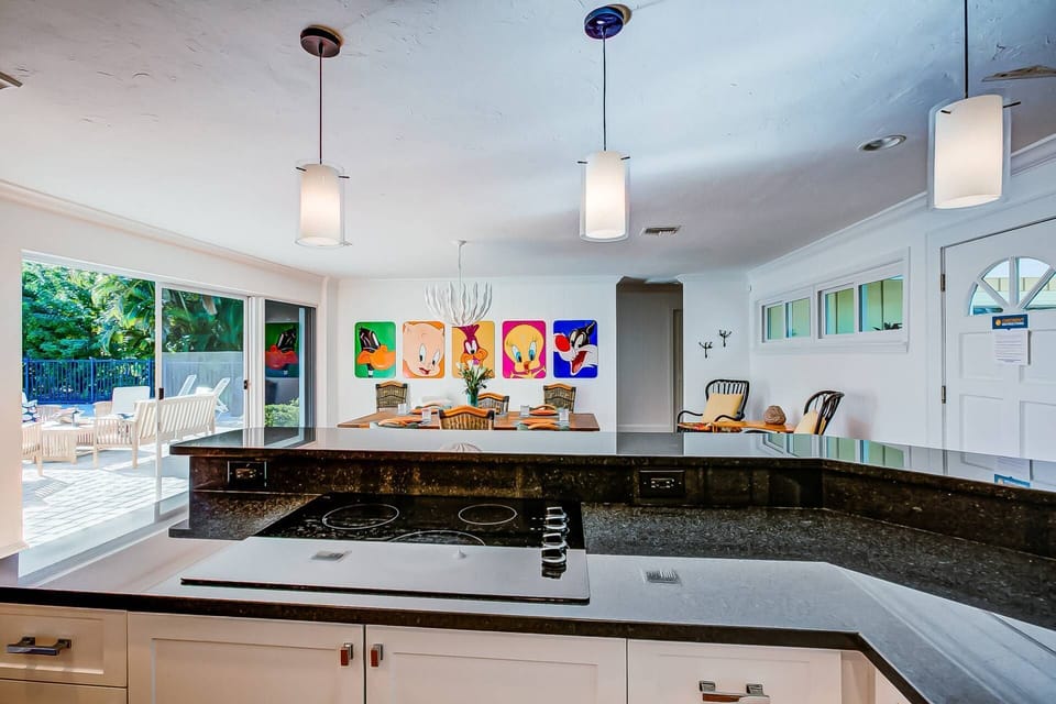Beautiful updated kitchen is open to the large dining area.