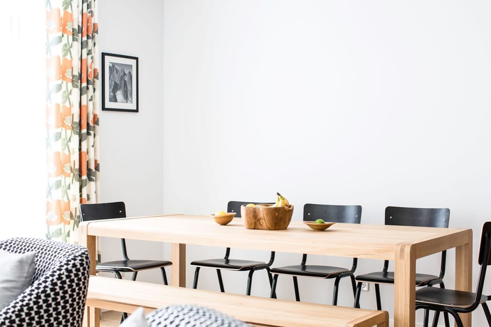 Large dining table comfortably seating 7 people