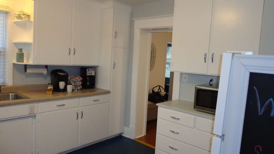 kitchen with door to dining room