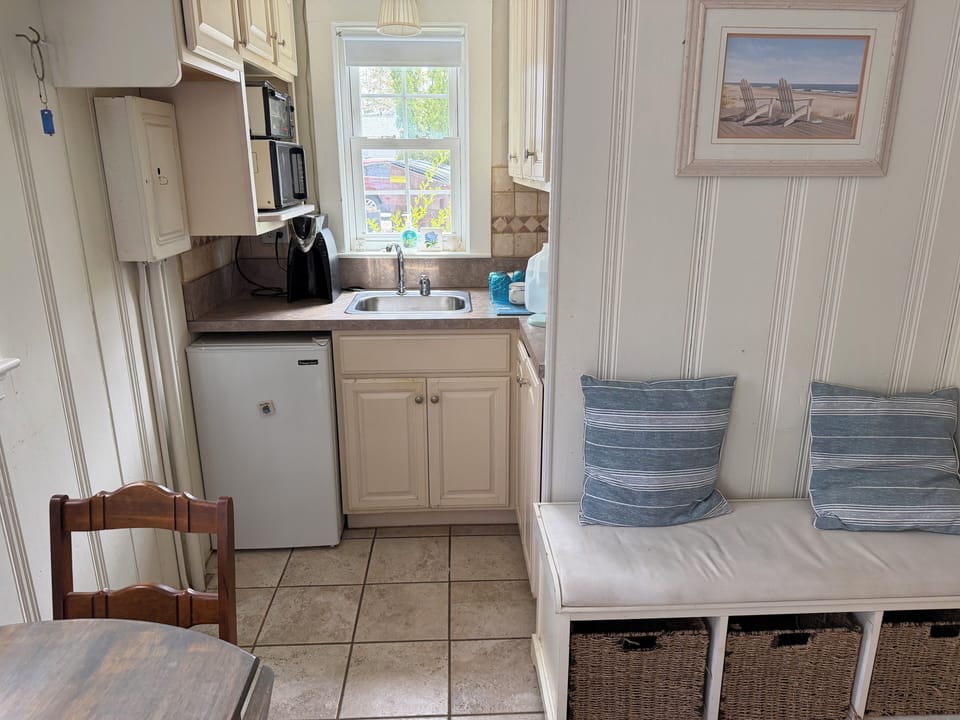 Kitchen has convection oven, micro, burners, and coffee keurig