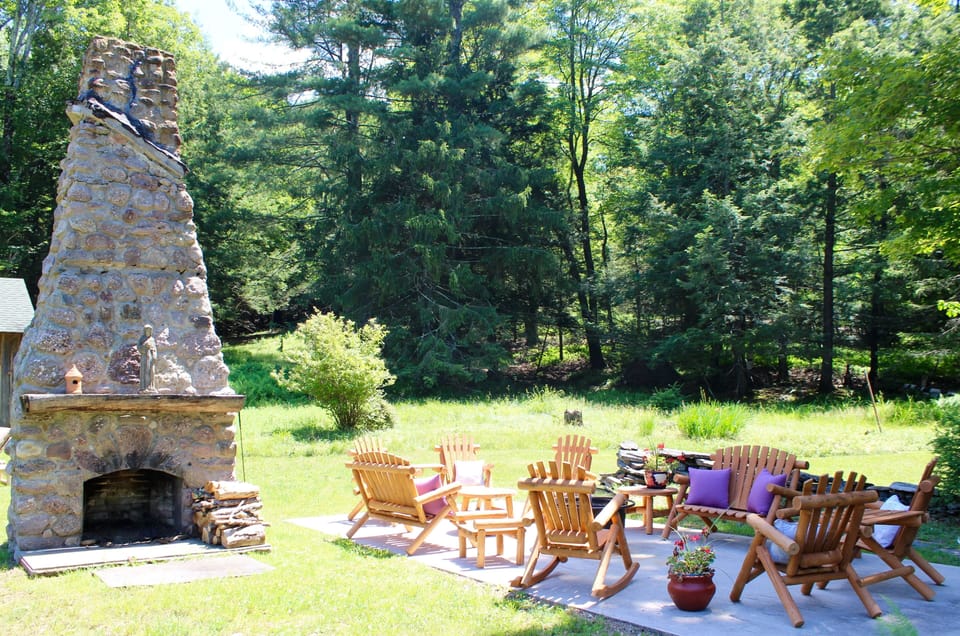 Sitting area with free standing fireplace and fire pit