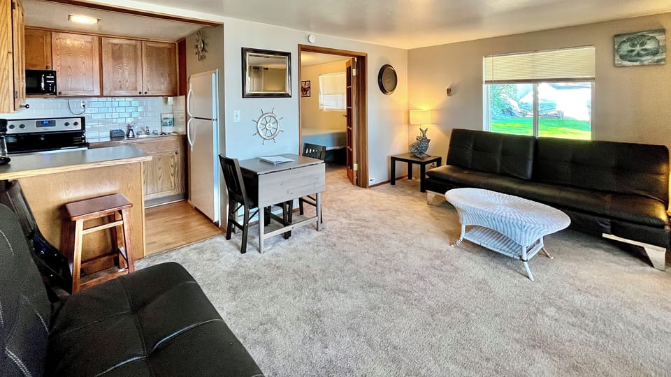 Open floor plan - Living room and kitchen, with bedroom to the side