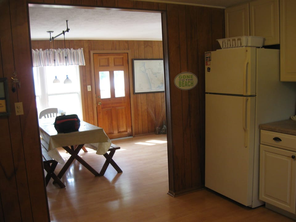 View from the kitchen into the dining area.