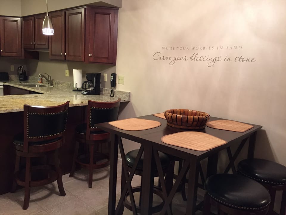 New dining table and stools to seat 4.