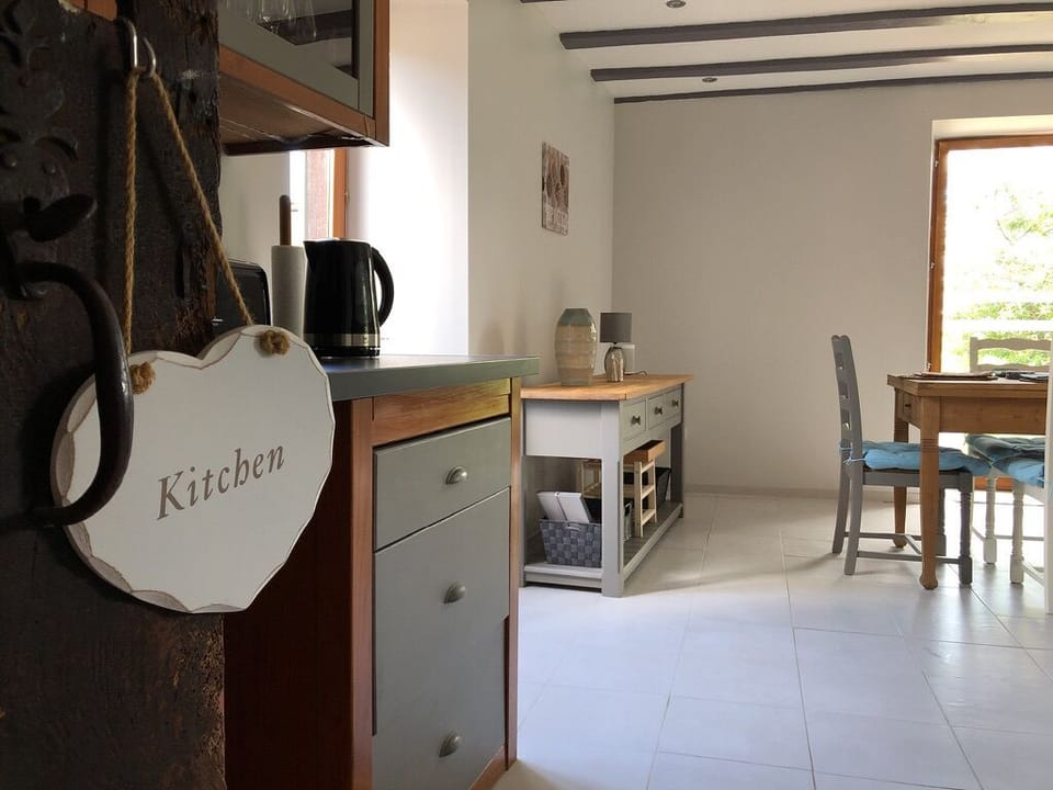 Kitchen - open plan with Dinning Area and direct access to the terrace.