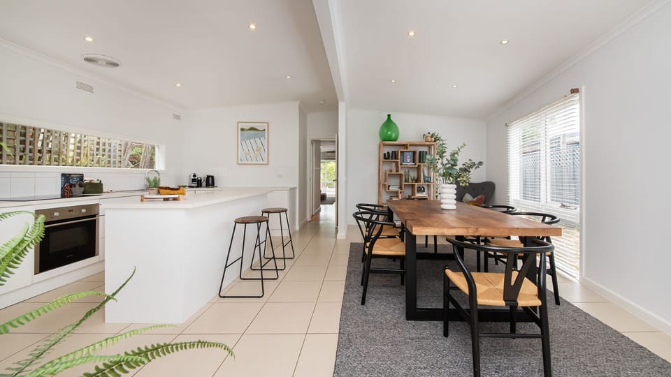 Welcome to our modern and well equipped kitchen, adjacent is our wooden and elegant dining table. 