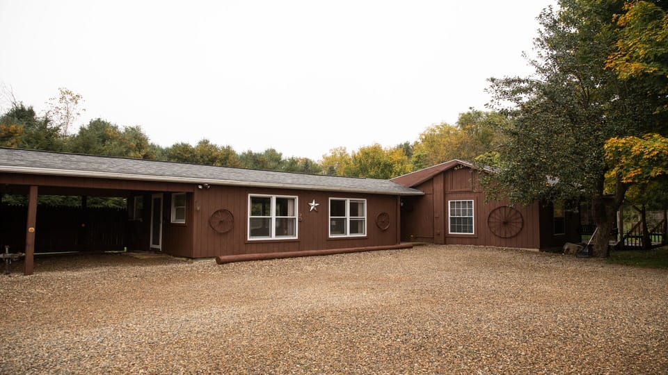 View from West showing carport 
