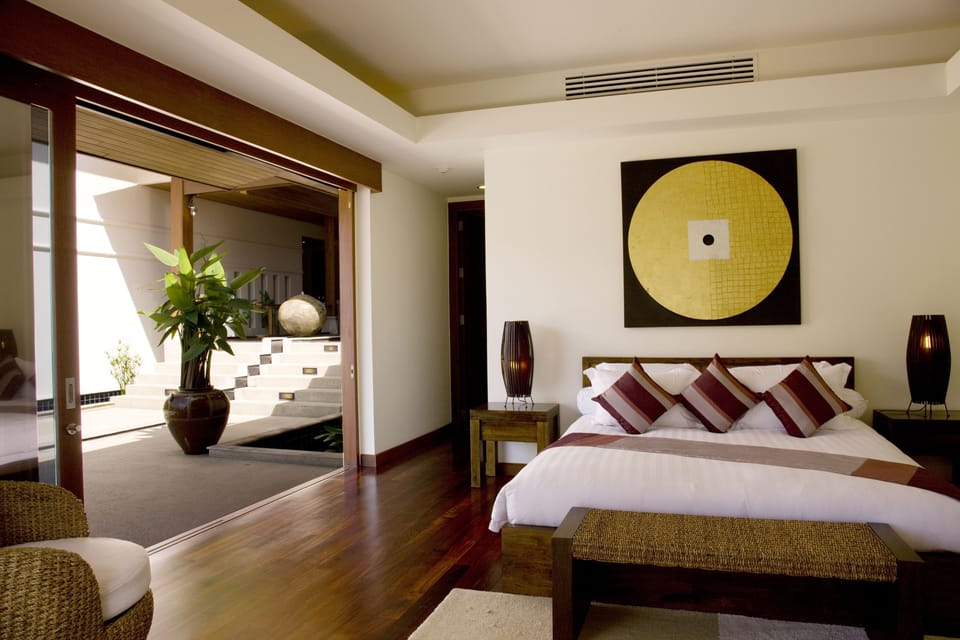 Bedroom with 1 king bed, smart TV, DVD player, walk-in wardrobe