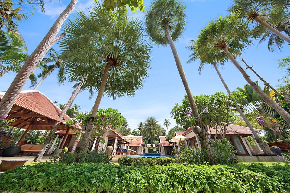 The villa is surrounded by a beautiful tropical garden.