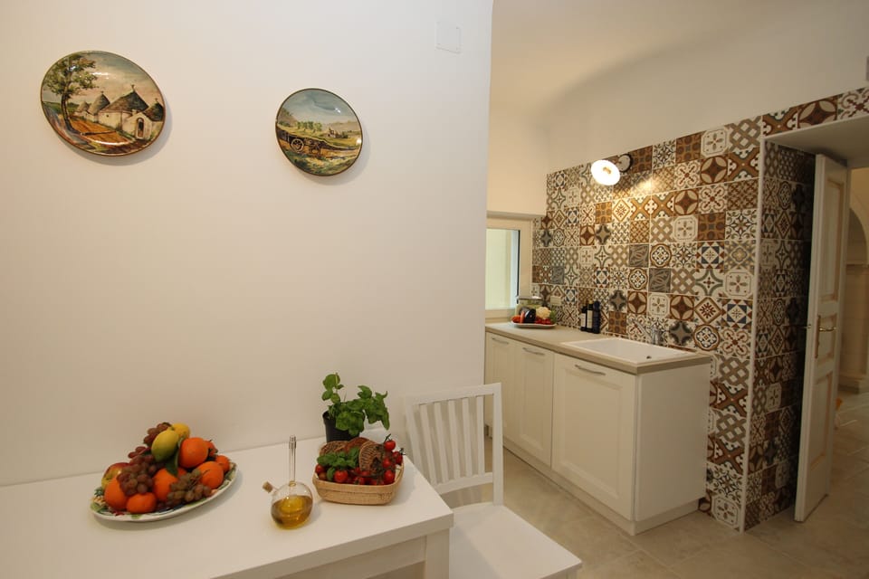 Stylish kitchen with 2 large fridges to store all your food and drinks