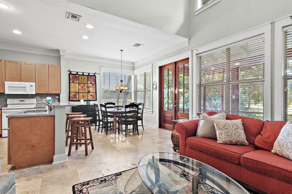 Open-concept living, dining, and kitchen spaces