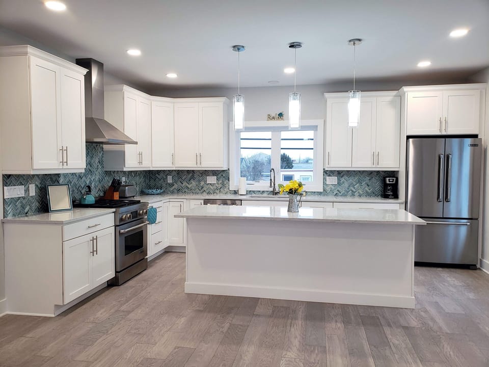 kitchen with quartz counterop, jenn air professional series appliances