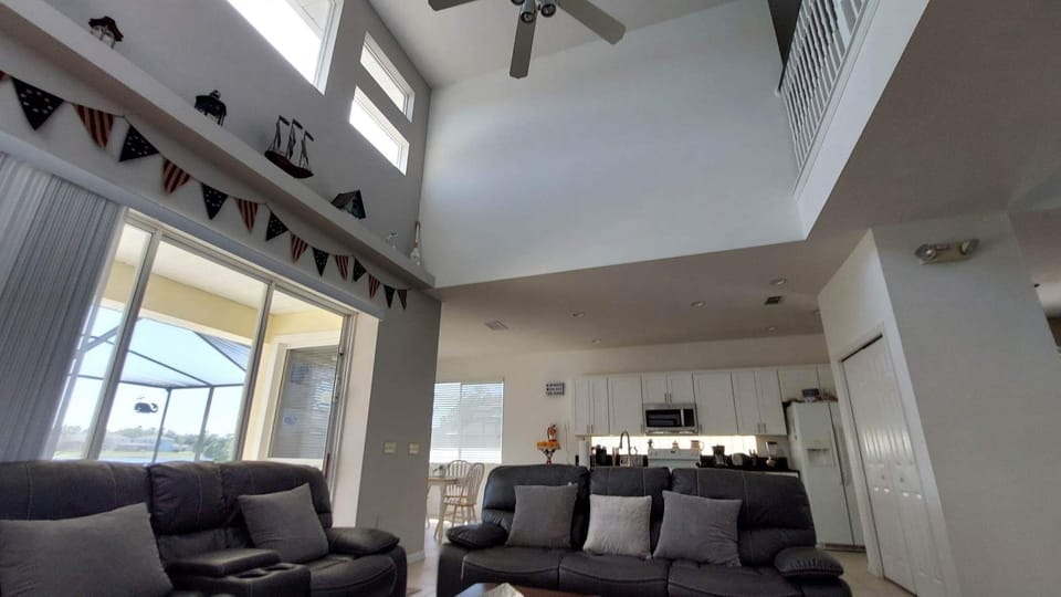 cathedral ceiling in family room adds to the spacious 'airy' feel of our home