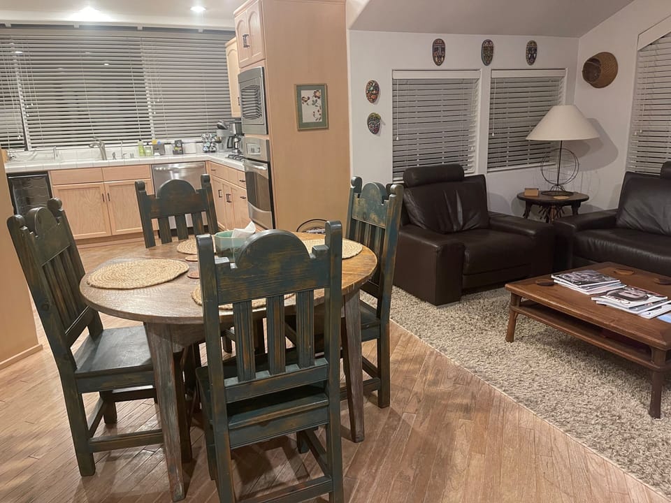 Family room and eat-in kitchen with full laundry room located next to this area.