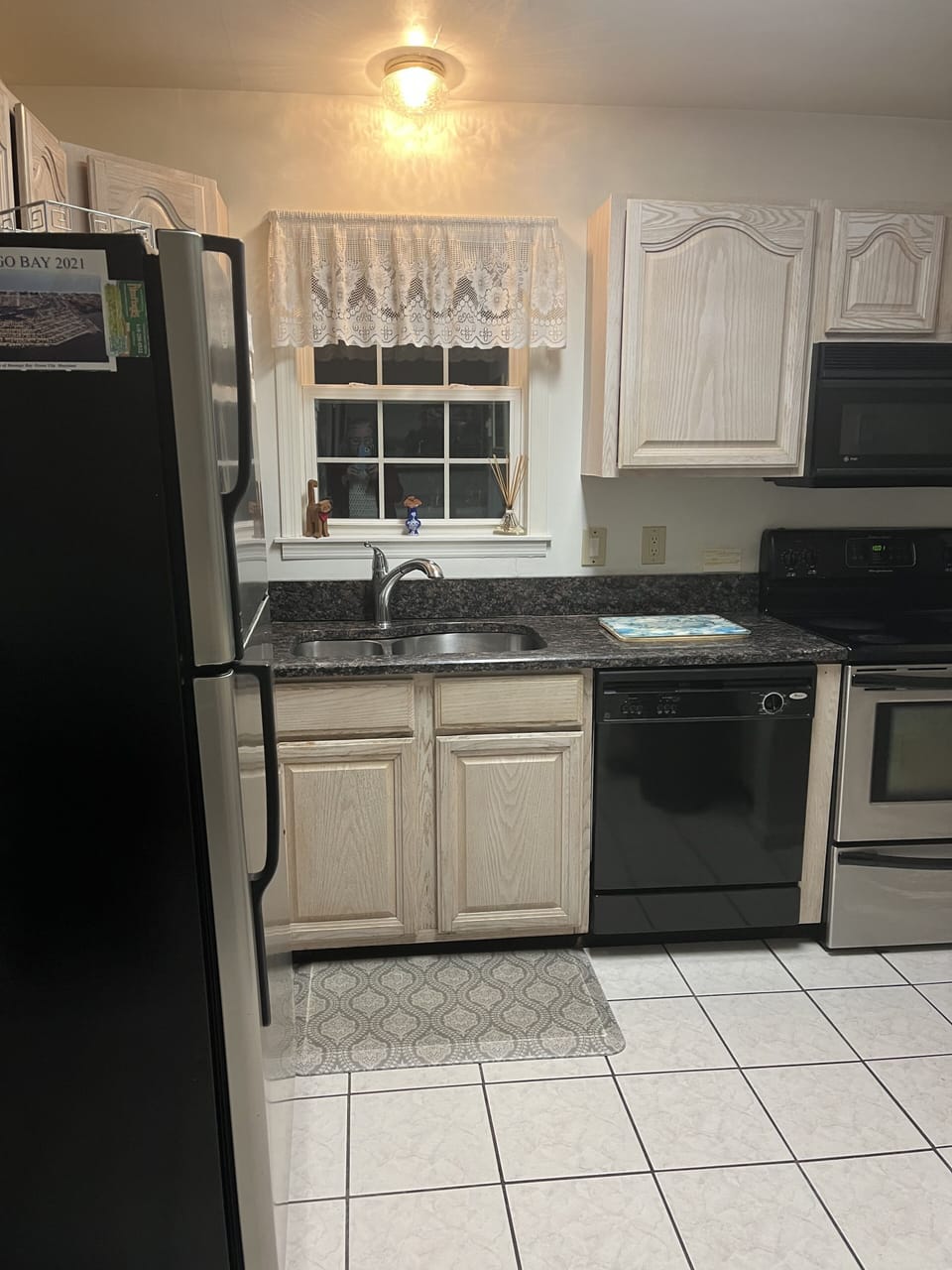 Kitchen w granite counter top stainless steel appliance fully equipped +bay view