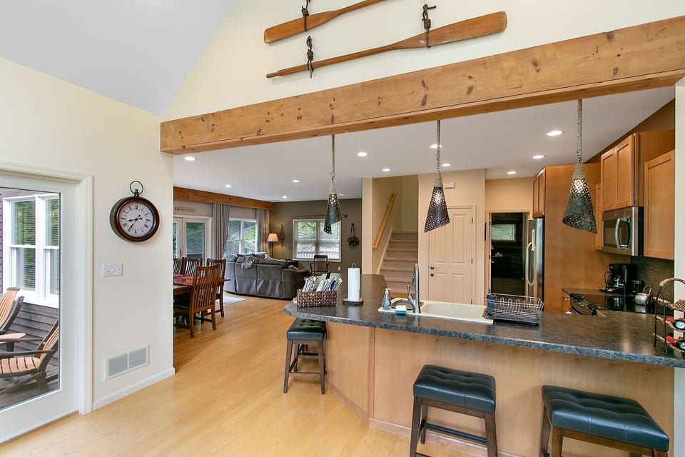 Looking from the sunroom into the kitchen area.