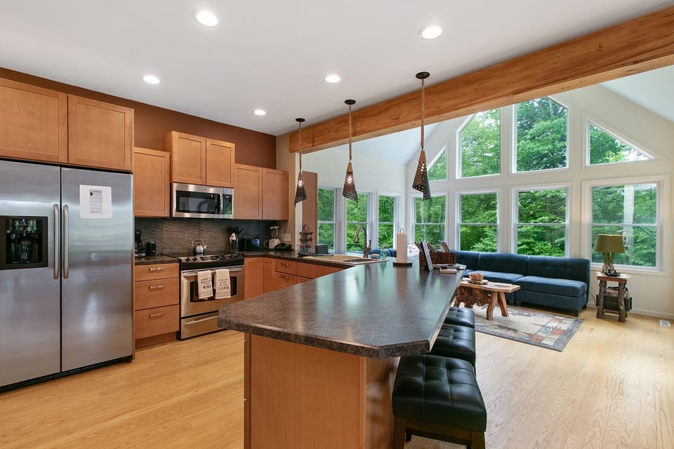 Kitchen with eat-in bar area - seating for 5.  