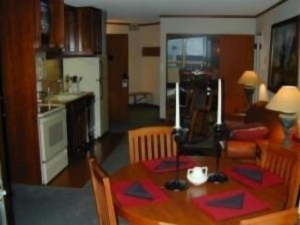 Kitchen area with pull out sofa and full bath