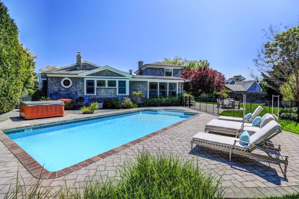 pool, hot tub, landscaping and children's pool safety fence.