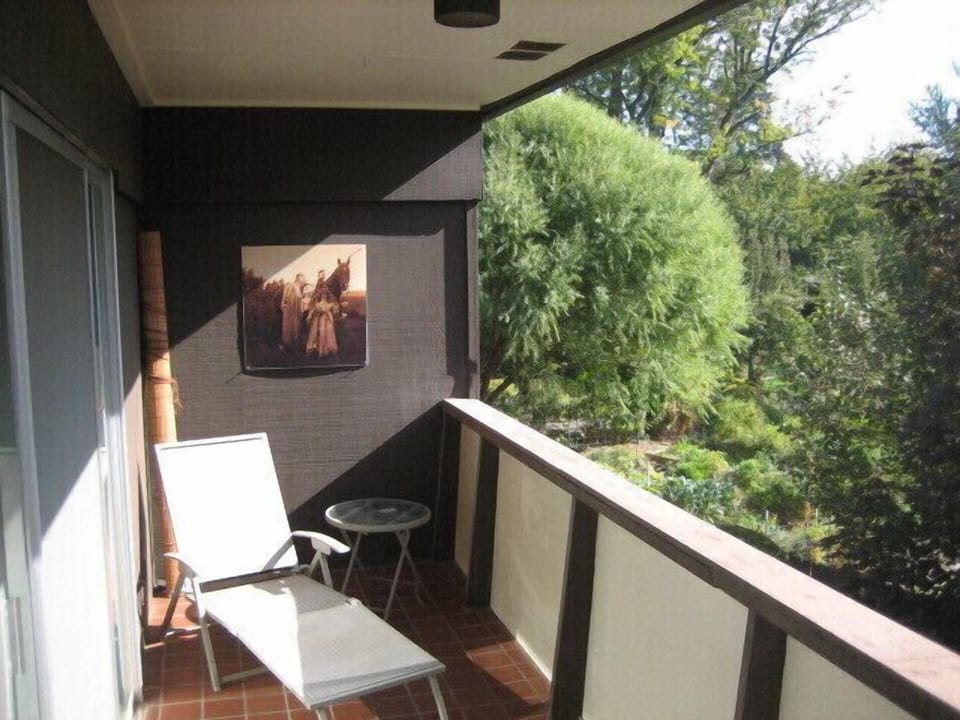 Private Outdoor Tile Balcony with Garden View
