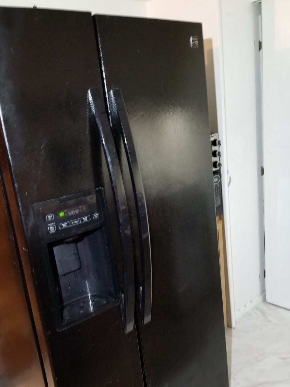 Refrigerator with purified water and ice maker.