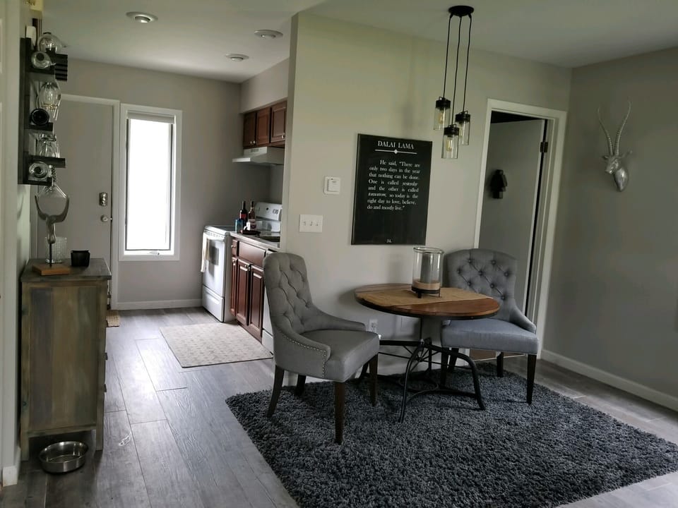 View of Dining table with Bathroom to the Right
