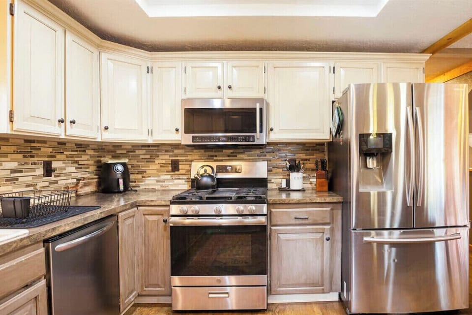Kitchen main cabin fully stocked with oils and spices 