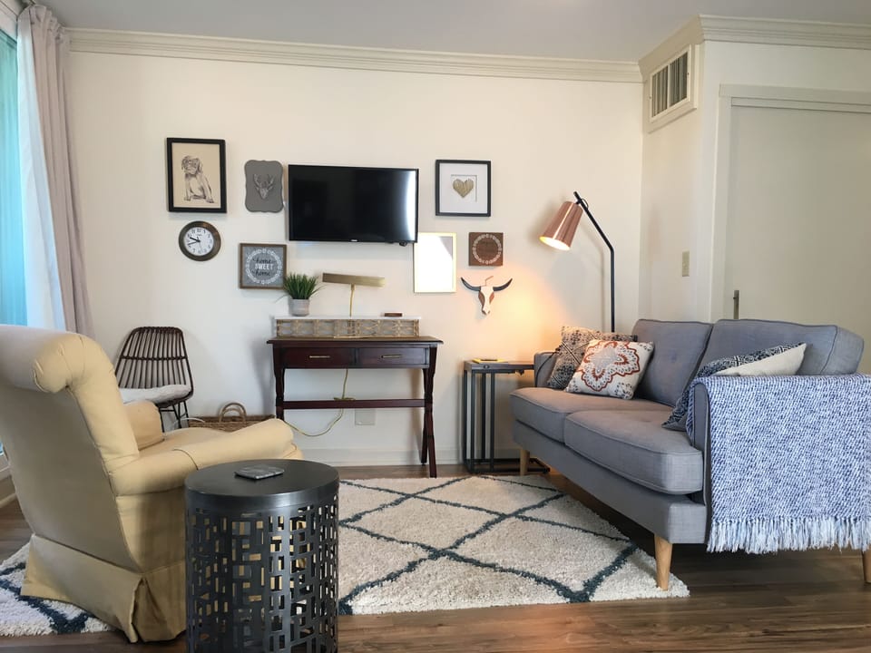 Living area. Desk has been upgraded. See addl. photos.