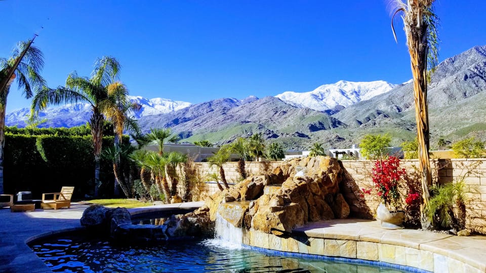 Pool with attached spa and waterfall